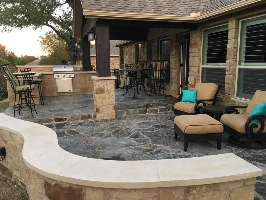 Finished concrete pathway beside lawn